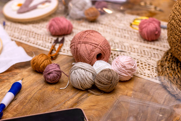 istock Different colored balls of wool for punch needle embroidery. 1460841390
