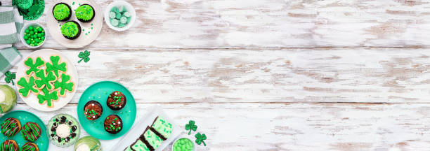 istock St Patricks Day dessert corner border against a white wood banner background 1460842664