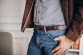 Man wearing modern leather belt