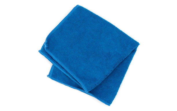 istock Blue Folded Microfiber Cleaning Cloth Isolated on White Background. Top View 1460843370