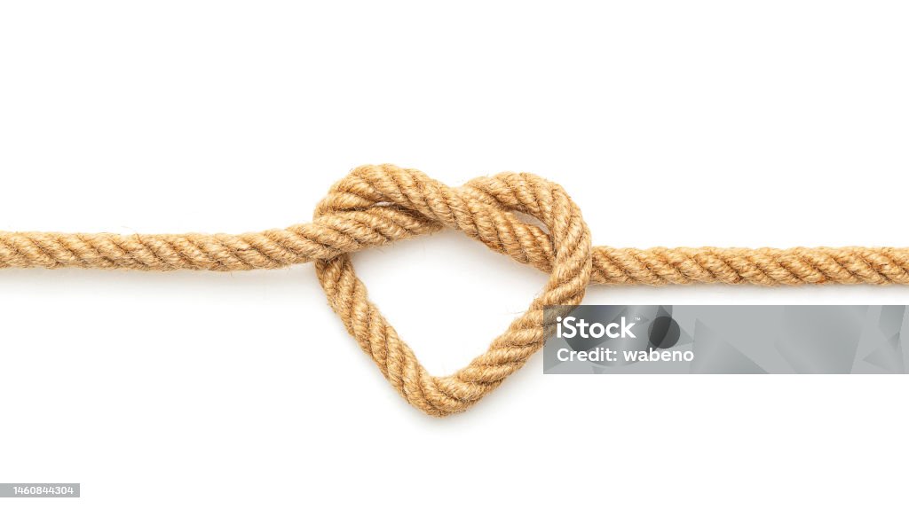 Heart Shaped Knot on a rope Rope with a heart shaped knot on white background Rope Stock Photo