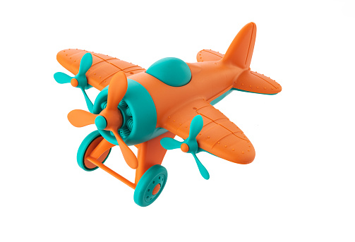 Color plastic airplane toy for kids isolated on white background