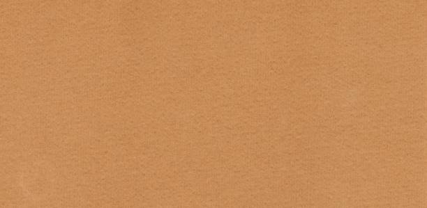 istock Abstract brown recycled paper texture background. Old Kraft paper box craft pattern. top view. 1460852849