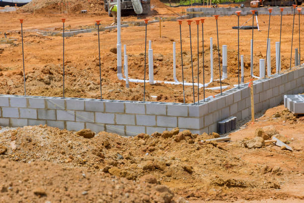 istock On a construction site at the moment, there is a stack of cement blocks that are ready to be laid on a wall of a house. 1460853236