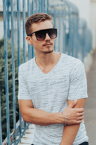Portrait of Young Man with Sunglasses