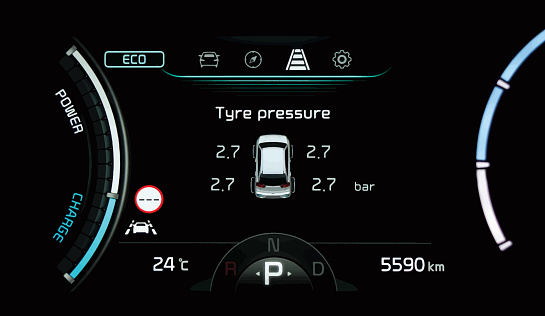 Close up of TPMS (Tire Pressure Monitoring System) monitoring display on modern car dashboard panel in full electric vehicle (EV). Pressure measurement in bar. Right tyre pressure.