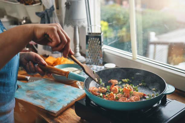 istock Preparing Shrimp and Grits in Domestic Kitchen 1460868016