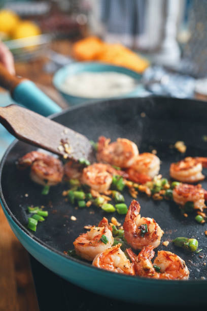 istock Preparing Shrimp and Grits in Domestic Kitchen 1460868027