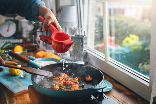 Preparing Shrimp and Grits in Domestic Kitchen
