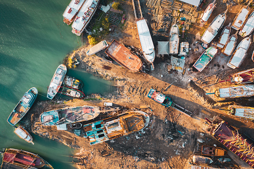 Aerial view of boats to be repaired at a shipyard.