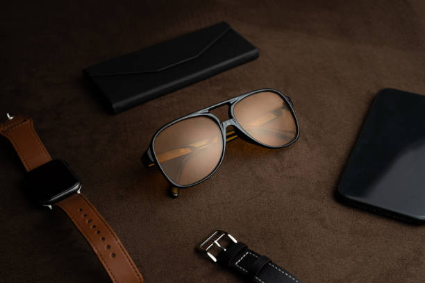 istock High Angle View Of Sunglasses on Table with other accessories 1460869158