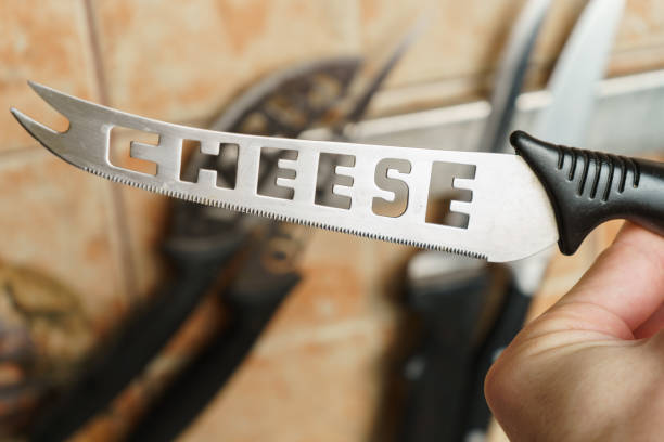 istock kitchen knife with cheese inscription 1460871529