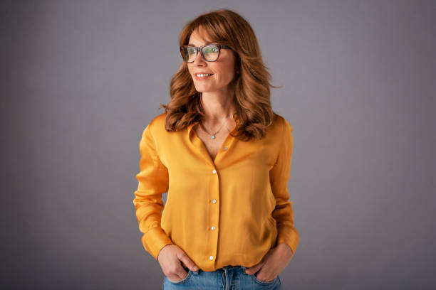 Smiling mature woman studio portrait
