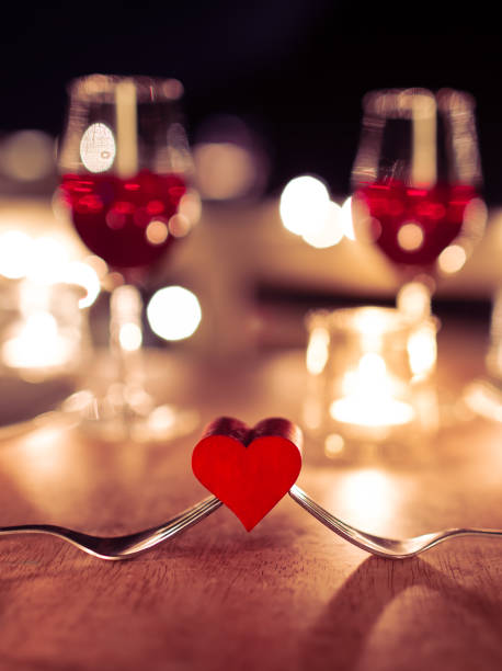 romantic candlelight dinner. - restaurant wine table table for two imagens e fotografias de stock