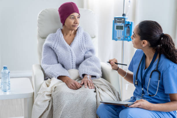 istock Nurse Talking with an Oncology Patient 1460874747