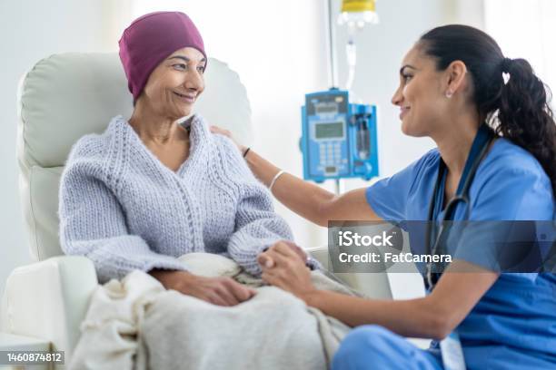 Nurse Talking With An Oncology Patient Stock Photo - Download Image Now - Patient, Oncology, Cancer - Illness