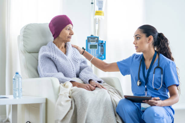 istock Nurse Talking with an Oncology Patient 1460874823