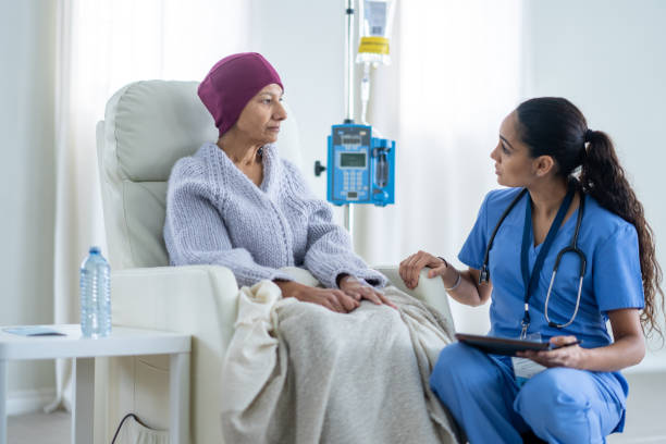istock Nurse Talking with an Oncology Patient 1460874830