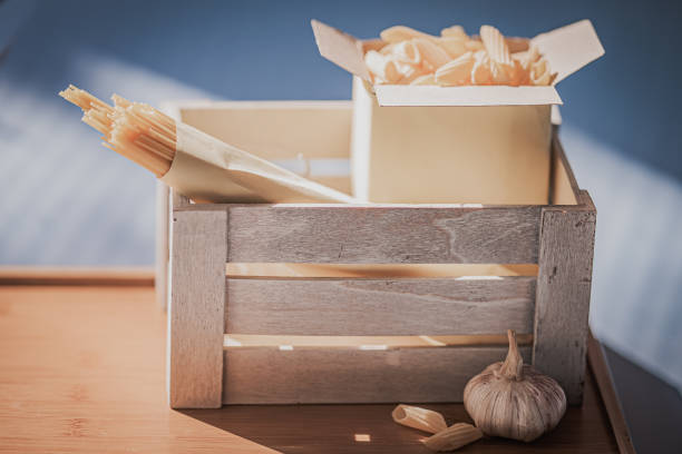 istock Wooden box with stored pasta - Poor nutrition concept 1460874932