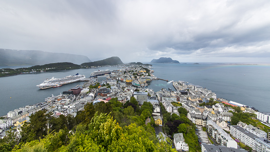 Aerial view of Ålesund in Norway with two cruise ships on the dock