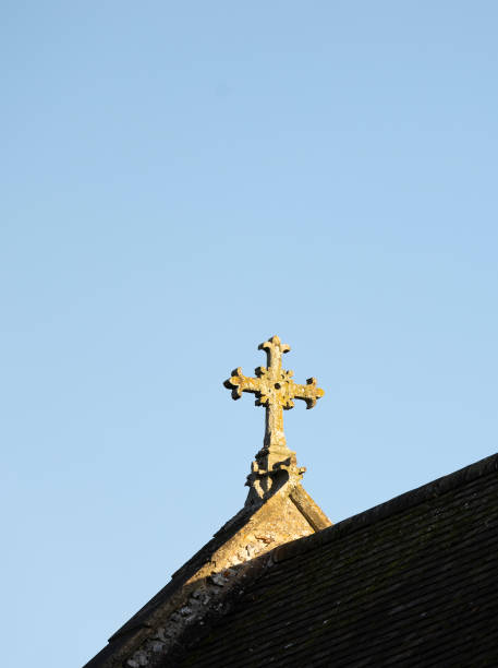 istock church cross on a old church roof 1460878033