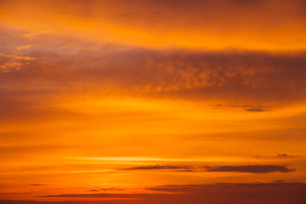 istock Beautiful colorful dramatic sky with clouds at sunset or sunrise. Abstract sky background 1460883655