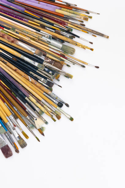 istock Many brushes for painting on a white background, top view. 1460883875