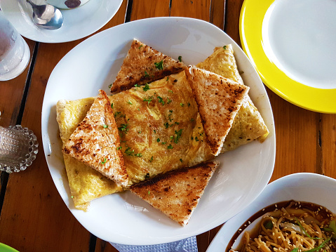 Rectangular Egg Omelet Complemented With Triangularsliced Toasted Bread ...
