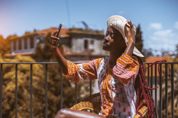 istock A pretty woman taking a selfie 1460889384