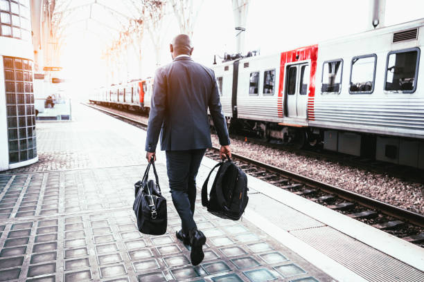 istock Black male about to catch a train 1460889406