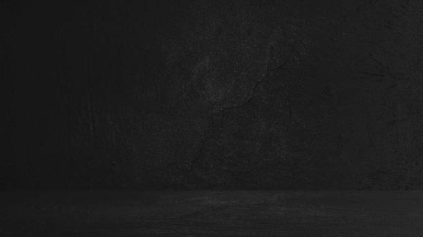 istock Rough concrete background. in two planes. Pedestal. Put something. Rembrand. Light falls. Darkness. Textured. Black background 1460893001