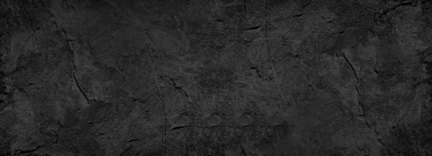 Black white stone texture. Rock surface. Close-up. Like a old rough concrete wall. Grunge background. Black white stone texture. Rock surface. Close-up. Like a old rough concrete wall. Dark gray grunge background with space for design. Template. Backdrop. Wide banner. Panoramic. table ledge stock pictures, royalty-free photos & images