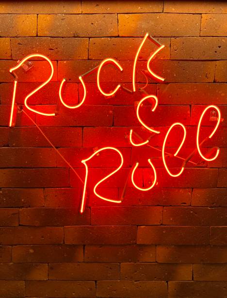 istock rock & roll red neon sign terracota brick background 1460894601