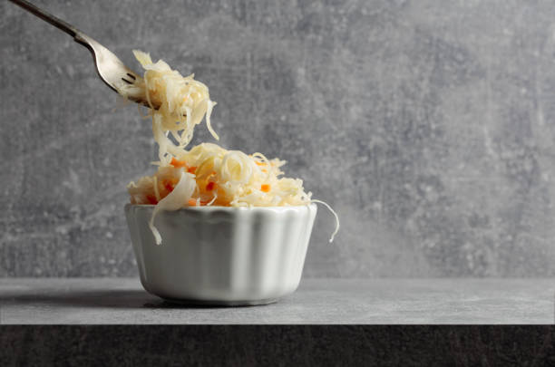 istock Bowl of sauerkraut with a carrot. 1460894749