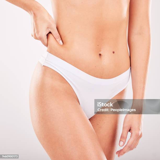 Concept Of Healthy Eating Close Up Cropped Photo Of Beautiful Womans Slim  Stomack Using Hands She Is Showing A Balance In Her Microflora And Bowel  Isolated On White Background Stock Photo 