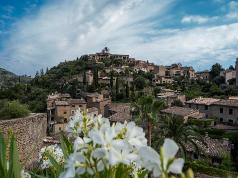 Panorama view of old historic rustic mediterranean village town Deia Serra de Tramuntana Mallorca Balearic Islands Spain Europe