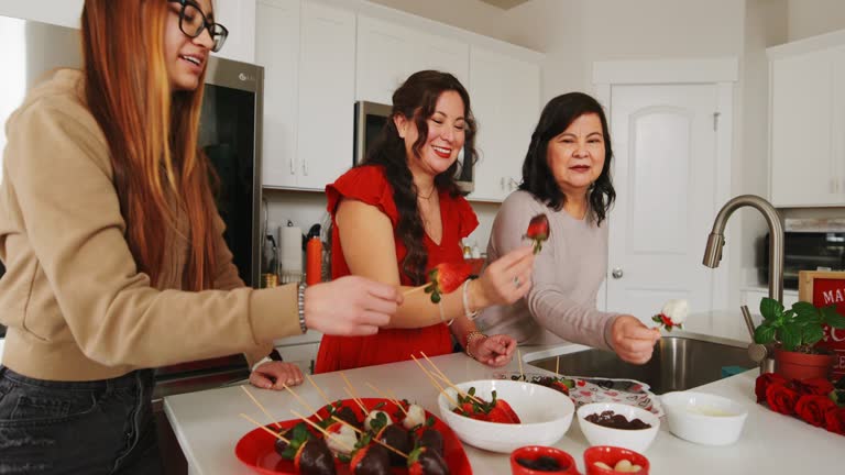 Family Valentines Day Celebration Making Chocolate Strawberries