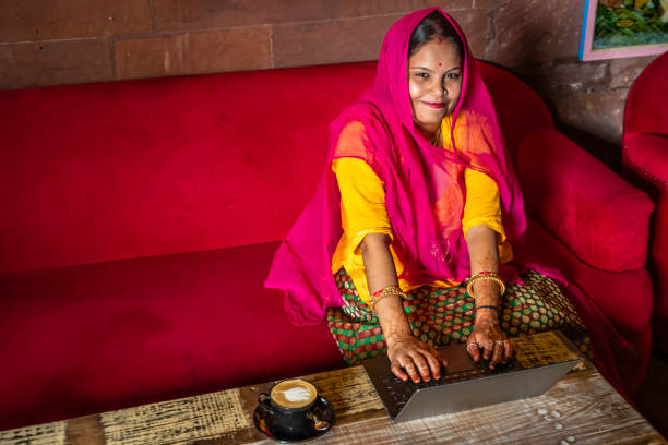 istock Young Indian woman using laptop, Jodhpur, India 1460901744