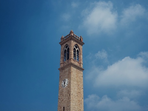 Isolated campanile bell clock tower of Lio Piccolo Santa Maria della Neve church Cavallino Treporti Venetian Lagoon Venice Veneto Italy Europe