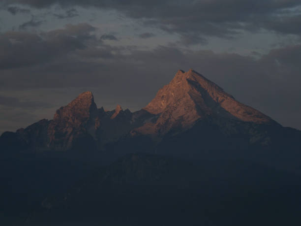 istock Panorama view of Watzmann alpine mountain range alpenglow from Marxenhoehe Berchtesgaden Upper Bavaria Germany alps 1460903067