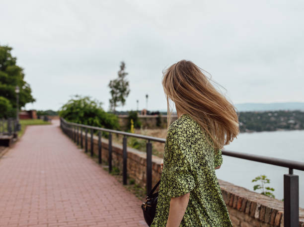 istock Woman Looking at a City View 1460904514