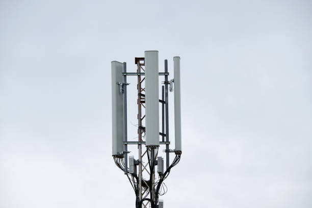 istock Wireless Communication Antenna Various GPS, cellphone, 3G, 4G and 5G equipped telecommunication tower on blue sky copy space background 1460906015