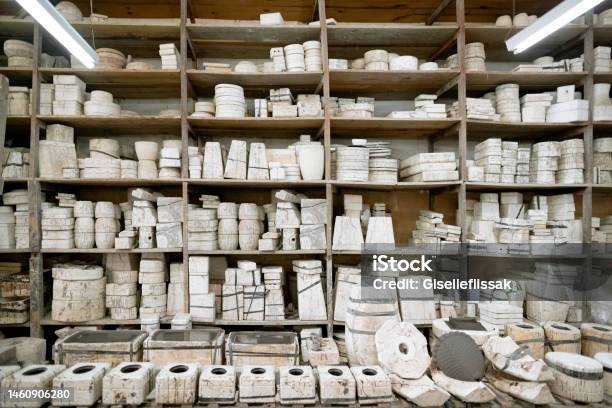 Molds For Making Ceramic Objects In A Factory Stock Photo - Download Image Now - Shelf, Collection, Warehouse