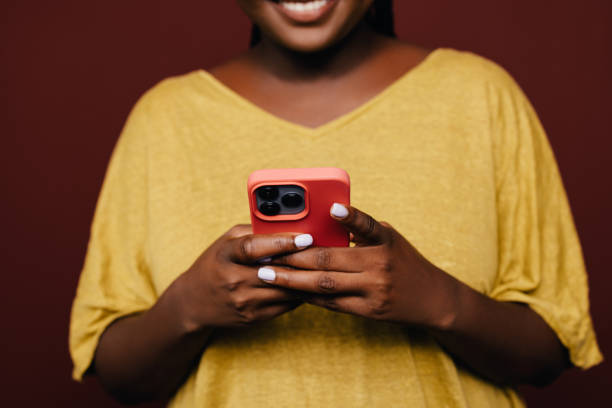 istock An Unrecognizable Beautiful Businesswoman Using Her Mobile Phone 1460913274