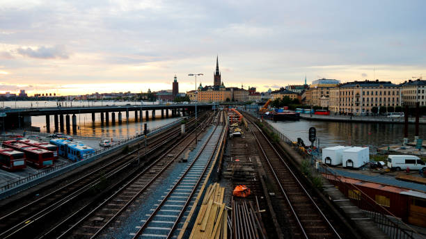 istock High angle view of railroad tracks against sky during sunset 1460916842