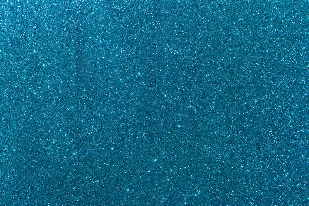 istock Background with sparkles. Backdrop with glitter. Shiny textured surface. Dark cyan 1460921696
