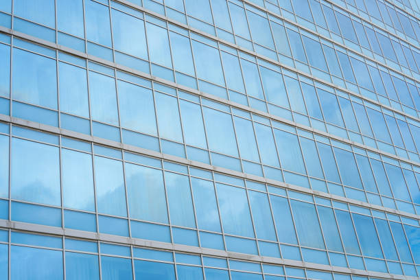 istock Sky and clouds reflection in the windows of modern skyscraper 1460927592