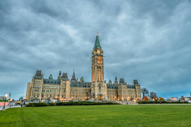 istock Parliament of Canada Peace Tower under dark cloudy sky 1460929373