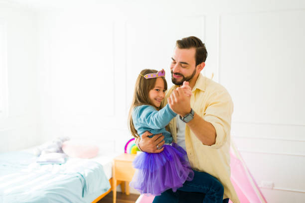 istock Loving dad dancing with his little girl 1460932711
