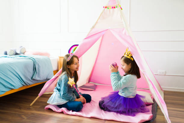 istock Best friends taking pictures while having fun on a play date 1460935350
